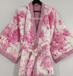 About this item Beautiful handmade printed Cotton Fabric winter Robe. NEW Men's or women's kimono dressing gown in wild pink block print cotton with quilted and reversible pattern Warm dressing gown Comfortable and stylish, ideal for getting out of bed or hanging out around the house. Suitable for both men and women. 2 applique pockets, matching belt, bat armholes for more ease. Beautiful design with hand made cotton. It is with three layer two cotton layers and inside fabric layer. Fabric: hand Winter Robes, Popular Now, Kimono Dressing Gown, Womens Kimono, Tiger Print, Womens Robes, Quilted Jacket, Cotton Quilts, Printed Cotton