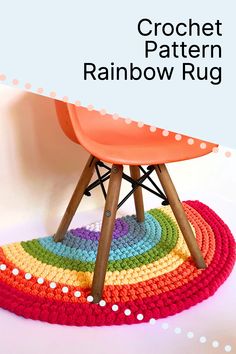 the crochet rainbow rug is sitting on top of a wooden chair