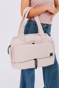 This tote duffle bag from FREE PEOPLE is a total MVP - Most Valuable Purse! Perfect for carrying all your essentials, it's sure to become your go-to bag for any adventure. Get ready to make a statement with this versatile and stylish duffle tote. Trendy Tote Duffle Bag With Adjustable Strap, Tote Duffle Bag With Detachable Strap, Trendy Duffle Bag With Removable Pouch For On-the-go, On-the-go Duffle Bag With Removable Pouch Satchel, On-the-go Duffle Bag With Removable Pouch And Double Handle, Body Accessories, Travel Bag, Get Ready, Duffle Bag