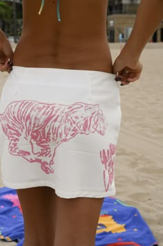 yllw - DELIA MINI SKIRT — WHITE - $78 | The Delia Skirt is the perfect printed mini to wear over swim or out for the day. The skirt is designed with a hand drawn tiger on the front and back of the white linen piece. Tiger Skirt, Vacation Skirts, Mini Skirt White, Pink Tiger, Dunhuang, Insta Stories, Skirt White, Casual Sets, New Hobbies