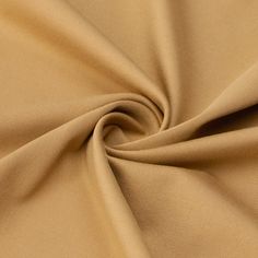 a close up view of a tan fabric