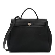 This is an authentic HERMES Toile Vache Calfskin Herbag 30 PM in Black. This stylish bag is crafted of black toile canvas in two different sizes that can be interchanged. The bag features a black leather crest with leather top handles and palladium silver hardware. High-end Coated Canvas Satchel With Detachable Strap, High-end Coated Canvas Satchel, Black Luxury Coated Canvas Satchel, Luxury Black Coated Canvas Satchel, High-end Black Coated Canvas Shoulder Bag, High-end Office Shoulder Bag With Leather Handles, High-end Black Satchel Shoulder Bag, High-end Coated Canvas Satchel With Top Handle, High-end Black Satchel For Everyday Use