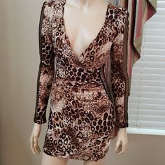 Day And Night Leopard Print Dress. This Dress Is Brand New Never Worn With Tags Brown V-neck Mini Dress For Party, Leopard Print V-neck Mini Dress For Party, Party Sheer V-neck Bodycon Dress, Brown Stretch Dresses For Party, Long Sleeve Brown Club Dress, Brown Long Sleeve Club Dress, Long Sleeve Brown Mini Dress For Night Out, Brown Long Sleeve Mini Dress For Night Out, Brown Long Sleeve Party Dress