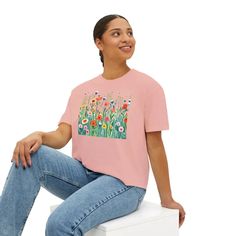 Wild Flowers Boxy Fit Tee: Comfort Meets Laidback StyleStep into a world of cozy vibes and total comfort with the Wild Flowers Boxy Fit Tee. This women's oversized tee is your go-to for laidback style that perfectly suits any occasion, from brunch dates to relaxing weekends. Crafted from 100% ring-spun cotton, it offers unmatchable softness and an effortlessly cool look. The slightly cropped, seamless body creates that chic, oversized fit that everyone loves.Comfort Colors proudly participates i Trendy Boxy Cropped T-shirt For Summer, Trendy Oversized Cropped T-shirt For Summer, Trendy Boxy Fit T-shirt For Summer, Trendy Cropped T-shirt For Spring Loungewear, Relaxed Spring Loungewear T-shirt, Spring Graphic Tee Cropped T-shirt, Graphic Cropped T-shirt For Spring, Graphic Tee Cropped T-shirt For Everyday Spring, Spring Pink Boxy Fit Top