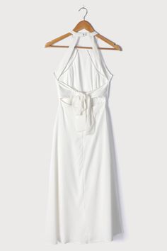 Lulus Exclusive! Make those sunny day memories in the Lulus Summer Dream White Tie-Back Halter Midi Dress! Sleek stretch-woven fabric shapes this classically cute dress that has a modified halter neckline (with button closures at back) and a princess-seamed bodice with sheer ladder trim accents. A banded waist tops a full midi skirt that will effortlessly flow with you. A tying sash at the back accents the open back. Hidden back zipper/clasp. Fit: This garment fits true to size. Length: Mid-calf Fitted A-line Halter Sundress, Fitted Halter Neck Maxi Dress With Tie Back, Halter Neck Lined Midi Dress For Date Night, Halter Neck Lined Dresses For Date Night, Date Night Halter Dress With Fitted Bodice, Fitted Halter Sundress With Tie Back, Fitted Sundress Halter Dress With Tie Back, Halter Neck Dress With Fitted Bodice And Lining, Fitted Bodice Halter Neck Lined Dress