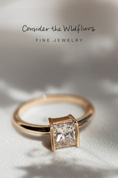 The Mae Diamond Ring evokes modern charm and sophistication with an angular, partial-bezel design. This ring features an approximate 1.06 carat princess cut diamond that is sure to dazzle and delight. #diamondring #modernring #engagement #engagementrings #ctwf Timeless Promise Ring With Square Cut, Luxury Square Cut Ring For Promise, Luxury Square Cut Rings For Promises, Timeless Radiant Cut Diamond Ring With Tension Setting, Timeless Princess Cut Promise Diamond Ring, Fine Jewelry Radiant Cut Diamond Ring With Tension Setting, Diamond Wedding Ring With Tension Setting And Princess Cut, Timeless Princess Cut Diamond Ring With Tension Setting, Princess Cut Diamond With Tension Setting For Wedding