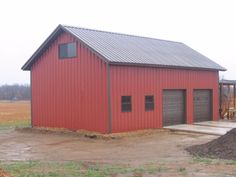 an image of a red barn being built