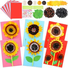 sunflowers made out of construction paper and other crafting materials are displayed in front of each other