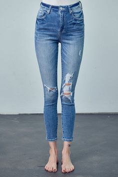 High Rise Ankle Skinny Jeans Embrace classic style with our High Rise Ankle Skinny Jeans. Crafted from a blend of cotton and spandex, these jeans offer a flattering high rise, a figure-hugging skinny fit, and a versatile ankle length. Perfect for a variety of looks. Key Features: High rise Skinny fit Ankle length Knee distress Stretch denim Details: Style: Casual Print/Pattern: Medium Silhouette: Skinny Fit: Skinny Embellishment: Knee Distress Length: Ankle-Length Closure: Button Closure Lining: Curvy Shorts, Curvy Swimwear, Swimwear Dress, Sweatshirt Set, Denim Details, Short Jumpsuit, High Waisted Denim, Print Pattern, Instagram Fashion