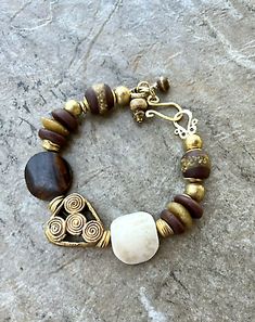 African Trade Bracelet Batik Bone Ghanaian and Ashanti Glass Wax Brass | eBay Artisan Brown Bracelet With Unique Variations, Artisan Brown Bracelets With Unique Variations, African Beaded Bracelets, African Bracelet, Bohemian Chic Jewelry, African Inspired Jewelry, Handmade Ceramic Jewelry, African Bracelets, Boho Beads