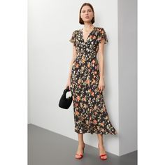 Black floral chiffon (100% Viscose). Lining (100% Polyester). Slip. Short sleeves. V-neck. 58.5" from shoulder to hemline. Imported. Elegant Flowy V-neck Dress With Floral Print, V-neck Chiffon Dress For Evening In Spring, V-neck Chiffon Maxi Dress With Floral Print, Elegant Floral Print V-neck Chiffon Dress, Floral Print Short Sleeve Chiffon Dress For Brunch, Chic Floral Print Chiffon Dress For Brunch, Chic Floral Chiffon Dress For Brunch, Party V-neck Dress With Floral Print And Short Sleeve, Elegant Printed V-neck Floral Dress