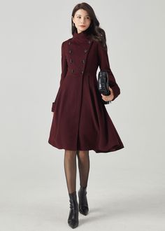 "FEATURES 50% wool, 50% wool blend Fully liner with polyester Two side pocket Stand-up collar Long sleeve,Turn-back cuffs with button detail Double breasted button front asymmetrical hemline For Winter, Autumn dry clean You can check the style in other colors from below link. https://bit.ly/3PCSIlK ★★Mode size Height 170cm (5′ 7″)  Bust 84 cm (33\")  Waist 66 cm (26\")  She wears size XS. ★★Bespoke Order Service If you Request other color Request the length Your height is not between 155 cm- 175 Formal Knee-length Winter Outerwear, Formal A-line Wool Coat For Fall, Elegant Knee-length Winter Outerwear, Chic A-line Wool Coat For Fall, Coat Plus Size, Wool Coat Women, Dress Coat, Coat Women, Wool Dress