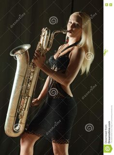 Photo about The beautiful girl plays a saxophone. Image of learn, person, performer - 16806855 Girls Play, Color Theory, Pose Reference, Musical Instruments, Flapper Dress, Royalty Free Stock Photos, Musical