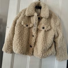 Zara Lined Jacket In Ecru In Med. Hip Length With Two Discreet Pockets On Side. Relaxed Fit. 26” Back Length 23” Armpit To Armpit Cream Fleece Jacket With Pockets For Fall, Cream Long Sleeve Outerwear For Fall, Cream Outerwear For Cold Fall Weather, Cream Outerwear For Cold Weather In Fall, Cozy Cream Long Sleeve Outerwear, Zara Beige Outerwear For Cold Weather, Cozy Cream Outerwear With Pockets, Cream Fleece Jacket For Winter, Cream Long Sleeve Fleece Jacket For Winter