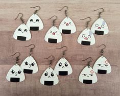 These cute little onigiri earrings are made from guitar picks.  Lightweight, adorable, and ready to rock at the next anime con!  *Listing is for 1 Pair. Earrings measure around 2 inches in length. Fish hook earrings are nickel and lead free. Please remove from wearing before swimming or showering. Nerdy Jewelry, Japan Gifts, Style Anime, Kawaii Gifts, Fish Hook Earrings, Friendship Gifts, Guitar Pick, Hook Earrings, Anime Style