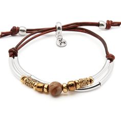 a brown leather bracelet with two gold beads and silver clasps on a white background