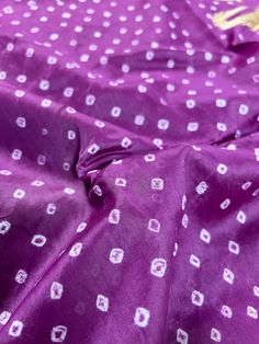 Handmade Semi Dupion Banarasi Silk Saree in Purple Color with Muted Gold Zari Weave Work. Please note - Color might look Light Purple in Sunlight and Dark Park in roomlight or dark light. Item : SareeBase Fabric : Semi Dupion Banarasi SilkColor : Purple Blouse piece : Comes with un-stitched Blouse piece.Blouse material : Dupion Banarasi SilkWork : HandwovenFall & Edging(Yes/No) : YesDisclaimer -:- Color variation is possible due to various reasons like phone or desktop setting, resolution etc. P Silk Bandhani Print Kurta For Navratri, Purple Silk Blouse Piece For Navratri, Silk Purple Salwar Kameez For Festivals, Silk Salwar Kameez In Purple For Festivals, Purple Silk Salwar Kameez For Festivals, Purple Silk Salwar Kameez For Navratri, Silk Bollywood Kurta With Bandhani Print, Purple Silk Blouse With Motifs, Eid Silk Salwar Kameez With Bandhani Print