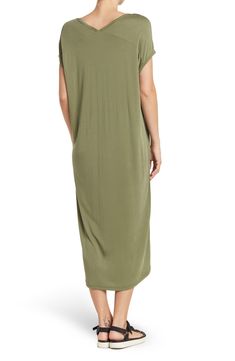 A breezy silhouette brings comfort and style to a tunic-inspired midi dress you'll want to wear every day. 47" length (size S) V-neck Short sleeves Slips on over head 100% lyocell Machine wash, tumble dry Imported Model Stats: 5'10" height; 34" bust; 27" waist; 35" hips. Model is wearing size S. Green V-neck Shift Maxi Dress, V-neck Viscose Dresses For Loungewear, Spring Maxi Dress Relaxed Fit Unlined, Spring Relaxed Fit Unlined Maxi Dress, Flowy V-neck Midi Dress For Loungewear, Relaxed Fit V-neck Midi Dress For Beach, Casual Unlined Maxi Dress For Daywear, Casual V-neck Maxi Dress For Daywear, Casual Daywear Maxi Dress