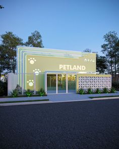 an artist's rendering of the entrance to petland at dusk, with trees in the background