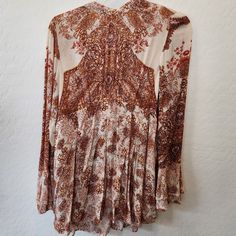 Free People Lady Luck Print Tunic Mini Dress Boho Hippie Style Size Small Brown Long Sleeve Dress With Paisley Print, Casual Brown Long Sleeve Dress With Paisley Print, Beige Printed Long Sleeve Dress, Cream Long Sleeve Mini Dress For Beach, Fitted Beige Printed Blouse, Beige Paisley Print Dress For Spring, Printed Beige Mini Dress, Casual Beige Dresses With Paisley Print, Cream Bohemian V-neck Mini Dress