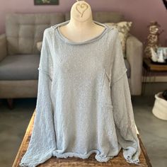 The Awesome Slouchy Light Blue Pullover From Three Birds Nest Is Slightly Sheer, Oversized, And Perfect For Layering. The Raw Edge Hem Is A Nice Boho Detail. I Purchased This Last Year And It Has Never Been Worn. Size Medium. 100% Polyester. Casual Oversized Light Blue Blouse, Oversized Crew Neck Blouse For Layering, Oversized Light Wash Tops For Spring, Light Blue Cozy Cotton Top, Cozy Light Blue Cotton Top, Oversized Blue Top For Layering, Oversized Light Blue Top For Fall, Oversized Light Blue Tops For Fall, Cozy Light Blue Tops For Spring