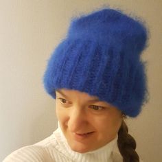 Fluffy mohair hat for women king blue Fluffy volumetric cap electric blue color Winter accessories womenMaterial: 25% Mohair - 24% Wool - 51% AcrylicColor: blue  (king blue/electric blue color)Size: one size fist most.Bright, soft and flufly, they are all connected with love and wrapped .Fit caps free, it does not press his head and leaves no stripes on the forehead.The product can be performed in any color. Leave a message, for special order.... do not hesitate to contact me...Care instructions Blue Winter Beanie Cap, Warm Blue Hats For Winter, Blue Beanie Hat For Winter, Warm Blue Beanie Hat, Blue Warm Beanie One Size, Warm Blue Beanie One Size, Warm Blue Cap, Warm Blue Hat, One Size, Blue Warm Hat, One Size Fits All