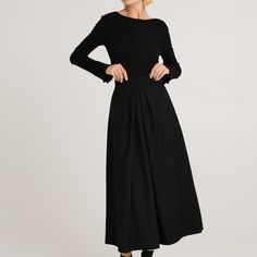 The black ankle-length Messina wool skirt is an elegant and classic piece of clothing. It is crafted from high-quality wool on a viscose lining. There are pleats at the front and back, which add volume and elegant shape to the skirt. Pockets in the side seams are a practical but discreet addition. Such a model combines classics with comfort and attention to detail, perfectly matching formal and casual styling. Main fabric: Wool 98%, Elastane 2% Lining: Viscose 100%    Dry cleaning only Elegant Wool Skirt For Formal Occasions, Elegant Wool Midi Skirt, Elegant Wool Pleated Skirt, Formal Black Wool Skirt, Classic Black Maxi Skirt For Work, Elegant Relaxed Maxi Skirt For Fall, Elegant Wool Full Skirt, Elegant Wide Leg Maxi Skirt For Fall, Elegant Full-length Voluminous Skirt