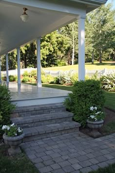 a porch with steps leading up to it