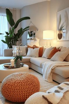 a living room filled with lots of furniture and pillows on top of it's floor