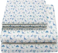 three sheets with dinosaurs on them and palm trees in blue, green and white colors