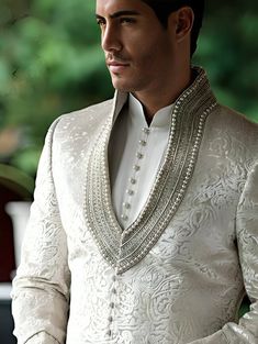 💥 Sherwani for Men | Traditional Indian Dress | Embroidered Sherwani Dress for Wedding |Groomsman Outfits ✿The Sherwani Suit is fully created with 100% High-Quality imported fabric. ✿Material: Brocade  ✿Colour: Beige ✿Collar type: High Neck With Embroidery  ✿Sherwani with Churidaar Pyjama  ✿Package contents: 1 Achkan + 1 Churidar/ Trouser Pyjama ✿Wash Care Instruction : Dry-Clean Only 🔲 CUSTOM ORDER 🔲 Please fill this Size Form with all the measurement details for your Order. We have an Easy DIY Measurement Toolkit to help you understand and carry out the whole measurement process in simple steps. You can fill this before/ after placing your order with us. (Kindly find the measurement form attached with this. *Its best if you can provide the customised sizes for your order to make a per Luxury Men's Sherwani For Diwali, Luxury Men's Churidar With Intricate Embroidery, Luxury Sherwani For Groom For Eid, Luxury Traditional Suits For Ceremonies, Luxury Unstitched Wedding Suit With Traditional Drape, Luxury Long Sleeve Ceremony Suit, Groom Dress Men Indian Engagement, Luxury Men's Salwar Kameez With Dabka Work, Luxury Men's Sherwani With Traditional Drape