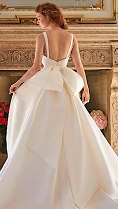 Wedding dress  with long  train made of high quality mikado. Open back , dechable bow Fabric  -mikado *Color -  ivory  or white * Lining with crynoline Size bridal gown: 0 -Bust 28,3"(72cm),Waist 20.4''(52cm)Hip 30"(76 cm) 2-Bust 30"(76cm),Waist 22''(56 cm), Hip 32,2"(82cm) 4-Bust 31"(80cm),Waist 23.3"(60cm), Hip33.9 (86cm) 6-Bust33,1"(84cm),Waist 25,2"(64cm), Hip35,4(90cm) 8-Bust 34,6"(88cm),Waist 26,8''(68cm)Hip 37"(94cm) 10-Bust 36,2"(92cm),Waist 28,3'(72cm)Hip 38.6"(98 cm) 12-Bust 37.8"(96cm),Waist 29.9''(76cm)Hip 38.6"(102 cm) 14-Bust 39.4"(100cm),Waist 31,5''(80cm)Hip 41.7"(106cm) 16-Bust 40.9"(104cm),Waist 33.1'(84cm)Hip 43.3 ("110cm) 18-Bust 42.5"(108cm),Waist 34.7''(88cm)Hip 44.9"114cm) 20- Bust 44,1"(112cm),Waist 36,2 ''(92cm)Hip 46,5"(118cm) 22-Bust 45,7"(116cm),Waist 37,8''(96c Wedding Dress With Big Bow On Back, Wedding Dresses With Bow On Back, Bow Back Wedding Dress, Wedding Dress Bow, Wedding Dress With Long Train, Dress With Long Train, Bow Fabric, Bow Wedding Dress, Dress Bow