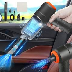 the car vacuum is being used to clean the inside of a vehicle's dashboard