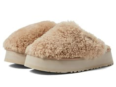 UGG Maxi Curly Platform - Women's Shoes : Sand : The UGG Maxi Curly Platform slip-on are perfect addition to your footwear collection. Real fur from sheep or lamb, artificially dyed and treated, from Australia, Ireland, the United Kingdom, or the United States. 17 mm curly sheepskin upper. 10 mm UGGplush upcycled wool, Lyocell insole and lining. Round toe and open back. Signature brand name logo on the upper. EVA outsole with high traction and durability. Imported. Measurements: Platform Height: Ugg Maxi Curly Platform, Fall Shoes Women 2024, Cute Winter Shoes, Womens Winter Shoes, Uggs Platform, Uggs Outfit Ideas, Fall Shoes Women, Platform Uggs, Platform Slip Ons