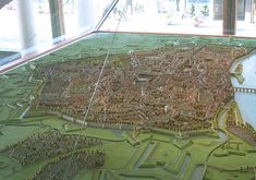 a model of a city is shown on the floor