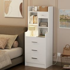 a bed room with a neatly made bed and a book shelf next to the bed