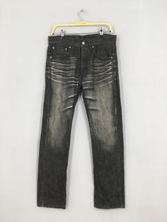 "Size 32x29 United Arrows Japan Black Faded Skinny Jeans Black Stonewash Jeans United Arrows Faded Black Denim Button Fly Slim Fit Jeans W32 Please contact me for any questions about this clothing before buying. SIZE MEASUREMENTS :- WAIST : 32\" inches HIPS : 40\" inches THIGH: 20\" inches  LEG OPENING : 14\" inches RISE : 11\" inches INSEAM : 29\" inches OUTSEAM (TOTAL LENGTH) : 39\" inches WEIGHT : 0.66 kg Condition : Good Condition. No holes and no stains. Please pay close attention to measur Black Denim Jeans With Button Closure, Classic Washed Black Jeans, Washed Black Straight Leg Jeans With Button Closure, Washed Black Cotton Jeans With Button Closure, Urban Washed Black Jeans, Casual Fitted Stonewashed Jeans, Casual Washed Black Stonewashed Jeans, Casual Stonewashed Washed Black Jeans, Casual Stonewashed Jeans In Washed Black