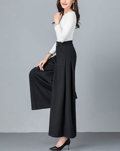 * A cool wide leg skirt pants, made of quality cotton blends. * Two pockets, they are big enough for your hands. * Fixed waist on front and elastic waist on back. * Material: 6% cotton, 90% polyester, 4% spandex * Let us know your usual size in your country and your overall height. * Can custom make waist size and length. * Size: True to US size, US 0-US 20 are available, you can let us know your usual size and height in your order. * Shipping: Free shipping Processing time : 5-7 Business days D Black Cotton Wide Leg Culottes, Black Wide Leg Cotton Culottes, High-waist Baggy Cotton Culottes, Baggy High-waist Cotton Culottes, Baggy Cotton High Waist Culottes, Cotton Wide Leg Culottes For Fall, Wide Leg Culottes With Pockets, Chic Ankle-length Cotton Culottes For Fall, Fall Cotton Wide-leg Culottes