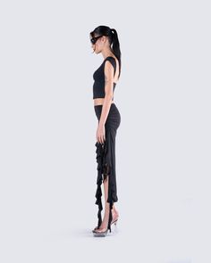 Let your sultry side shine in this sexy all-black fit 🖤 Featuring a black backless top, paired with a black ruffled maxi skirt for a look that will have you turning heads and taking names 🤤 Elegant Black Ruched Maxi Skirt, Chic Ruched Maxi Skirt For Party, Chic Party Maxi Skirt With Ruched Details, Black Ruched Maxi Skirt For Evening, Chic Ruched Maxi Skirt For Evening, Chic Fitted Maxi Skirt For Night Out, Chic Ruffled Maxi Skirt For Evening, Black Fitted Ruched Maxi Skirt, Fitted Ruched Black Maxi Skirt