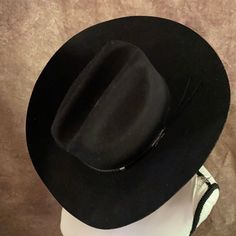 100% Wool. Made In The Usa. Very Nice. Black Flat Bill Hat For Ranch, Black Flat Bill Hats For Country Events, Black Flat Bill Felt Hat For Country Events, Flat Bill Black Hat For Rodeo, Black Winter Hat For Ranch, Wide Brim Black Hat For Ranch, Black Wide Brim Hat For Ranch, Casual Black Felt Hat For Rodeo, Black Short Brim Hat For Ranch