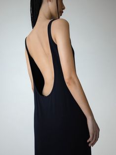 A maxi length Tencel Spandex blend sleeveless dress. Stunning backless design with scoop detail. Model is in MINUSEY ONE SIZE. ✔️ Free worldwide express shipping over $100✔️ Loved by 6,500+ customers✔️ Limited edition collections, maximum styleStay ahead of the trend with can’t-find-anywhere-else staples. Your closet will thank you 💕 * MINUSEY ONE SIZE = EU 34-38, US 2-6* 96% Tencel / 4% Spandex* Dry clean* Made in Korea - Model Height: 172cm/5'7" (US2, EU34) Summer Backless Elastane Dress, Backless Summer Elastane Dresses, Backless Elastane Summer Dress, Summer Bodycon Backless Dress In Elastane, Chic Backless Summer Dress In Elastane, Stretch Maxi Dress With Low Back, Summer Bodycon Elastane Backless Dress, Chic Summer Backless Elastane Dress, Chic Backless Elastane Dress For Summer