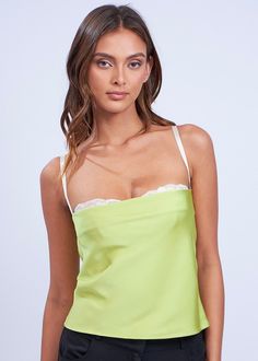 Green crop top with built-in cream bralette 100% Polyester Size and Fit: Model height 5'6" wearing size Small Chic Crop Top Camisole With Built-in Bra, Brunch Camisole With Built-in Bra, Green Crop Top With Built-in Bra For Summer, Chic Camisole With Built-in Bra For Brunch, Feminine Bra-friendly Camisole Top, Flirty Cropped Top With Built-in Bra, Green Camisole Crop Top With Built-in Bra, Flirty Fitted Cami Crop Top, Flirty Crop Top With Built-in Bra For Spring