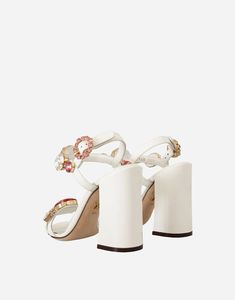 Elegant and modern, these Keira silver-tone sandals from Dolce & Gabbana are crystal embellished With slim buckle ankle straps, this open-toe pair features rose print across the footbed a stiletto heel for touch of femininity. Model Heels, Ankle Strap Sandals Heels, Embellished Sandals, Leather Logo, Ankle Strap Heels, Heels Sandals, Shoe Size Chart, Ankle Straps, Rose Print