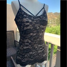 This Nwt Boston Proper Camisole Is Marked “Lace Made To Be Seen Cami Proper Black”. The Bra Is Lined All The Way Around And The Front Has A Nude Lining. The Straps Are Adjustable. Facing 100% Nylon Front 90% Polyester 10% Spandex Back 91% Polyester 9% Spandex Lining 91% Polyester 9% Spandex Night Out Lace Cami Top With Built-in Bra, Lace Stretch Tank Top For Night Out, Stretch Lace Tank Top For Night Out, Lace Stretch Camisole For Night Out, Fitted Lace Camisole Casual Style, Casual Fitted Lace Camisole, Lace Cami Tank Top For Night Out, Fitted Lace Top Tank Camisole, Fitted Lace Top Camisole Tank