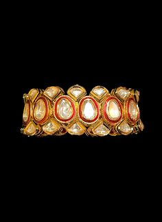 Bridal kundan bracelet with red meenakari Ceremonial Kundan Fusion Bangle, Ceremonial Fusion Kundan Bangle, Elegant Tilla Cuff Bracelet For Festive Occasions, Fusion Style Kundan Bracelets For Ceremonial Occasions, Heavy Fusion Style Bracelets For Festive Occasions, Heavy Fusion Bracelets For Festive Occasions, Heavy Fusion Bracelet For Festive Occasions, Fusion Style Wedding Bracelets With Cutdana, Ceremonial Kundan Fusion Bracelet