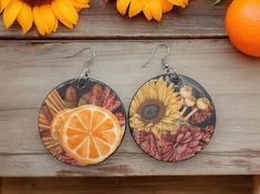 These beautiful Sunflower earrings are perfect with the oranges and are great for any occasion. The not only look great, but they are lightweight and easy to wear. They can also make the perfect gift! Wood base size: 2in diameter Wood finish: Diamond Glaze **NOTE** Each earring is handmade and may have a few blemishes to the finished product which may include tiny bubbles from the diamond glaze. Can be hard sometimes to get all the bubbles out, but they still look great. Also colors may slightly look different from photos due to lighting exposure or from screen projections. Orange Circle Earrings For Gift, Orange Circular Earrings For Gift, Sunflower Earrings, Wooden Earrings, Art Paint, Wood Finish, Jewelry Earrings Dangle, Etsy Earrings, Glaze