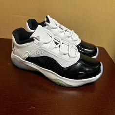 Jordan Boys White Black Air Jordan 11 Comfort Low Dv2208-100 Sneakers Size Us 7 Brand: Jordan Department: Boys Size: 7 Color: White Black Type: Athletic Style: Sneaker Style Code: Dv2208-100 Pattern: Solid Theme: Sports Shoe Shaft Style: Low Top Closure: Lace Up Features: Comfort, Adjustable Occasion: Activewear Seasons: All Season Condition: New Without Box I Offer Discounts For All Return Customers. - Jvs White Sole Low-top Jordan Shoes With Laces, Low-top Jordan Shoes With Branded Insole And White Sole, Low-top Jordan Shoes With Boost Midsole For Light Sports, Jordan Shoes With Air Cushioning For Light Sports, Jordan Low-top Running Shoes, Low-top Jordan Shoes With Air Cushioning And White Sole, Low-top Jordan Shoes For Light Sports With White Sole, Low-top Jordan Running Shoes With Laces, Low-top Jordan Running Shoes