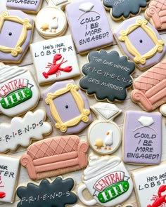 decorated cookies are arranged on a table