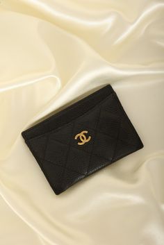 CONDITION: VERY GOOD , dustbag, box, and care booklet.??¨ This cute little Chanel cardholder in black caviar with gold hardware adds the perfect touch of sleekness and style to your wardrobe! Includes three card slots and a pocket in the middle. Simple, yet a stylish statement.??¨~ Beth Crafted in??¨2021 4.5" L x 3" H??¨ Please note: Slight discoloration on hardware.??¨ In order to meet the current demand and given the??¨nature of sourcing inventory, all sales are final. Please be sure to review all pictures and ask any questions prior to making a purchase! To prevent any form of fraud, I??¨keep video records of??¨myself??¨packaging??¨and dropping off each order, and??¨all??¨orders ship with??¨tracking and??¨signature??¨confirmation. Please ensure your shipping address is correct as we are Chanel Cardholder, Girl Backpacks School, Chanel Caviar, Black Caviar, Handbag Wallet, Wallet Accessories, Girl Backpacks, Exclusive Bag, Nappa Leather