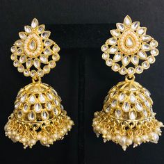 Kundan Pearl Jhumka/ Golden Kundan Jhumka/ Sabyasachi Kundan Earring/ Indian Punjabi Jhumka/ Wedding Earrings/ Bridesmaid Kundan Jhumka Features Traditional Kundan Jhumka Handcrafted To Perfection Light Weight Jewelry Perfect For Indian Weddings And Celebrations A Beautiful & Memorable Gift for Weddings and Special Occasions 22k gold plated jewelry Length: 2.85 Inches Click here to see the complete collection of Kundan and Polki Statement Earrings at AryaFashions: https://www.etsy.com/shop/AryaF Punjabi Jhumka, Kundan Jhumka, Earring Indian, Light Weight Jewelry, Golden Earrings, Earrings Bridesmaid, Kundan Earrings, Indian Weddings, Fantasy Jewelry